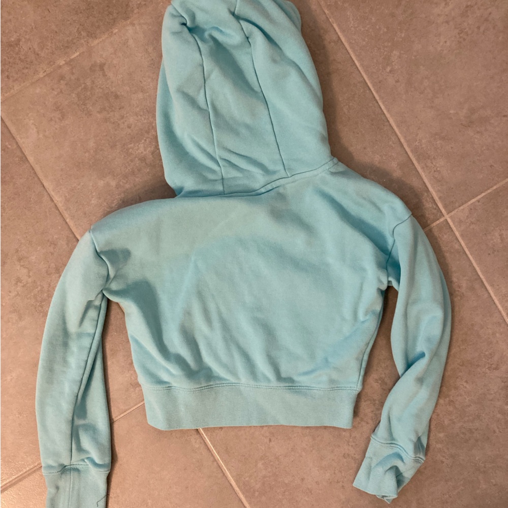 Girls turquoise Nike cropped hooded sweatshirt. Girls size small. - Picture 2 of 3